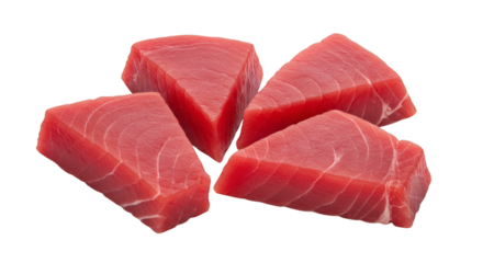 A close up view of four triangular cuts of raw tuna arranged together in a cluster formation isolated on transparent background