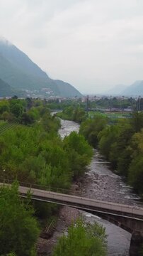 Vertical clip of Bolzano, a cultural hub in northern Italy where rivers and Alpine life meet