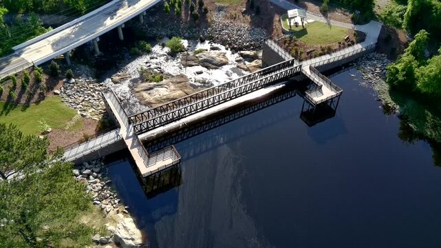 Gibson Pond Dam in Lexington South Carolina with pollen floating on the water
