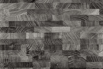 Black wooden board as background, top view. Wooden table, hardwood, wood grain.