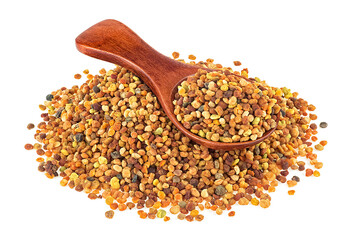 Honey bee pollen in wooden spoon isolated over white background. Bee bread. Ambrosia. Perga.