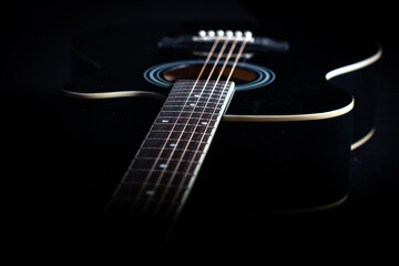 guitar on a black background. Musical instrument