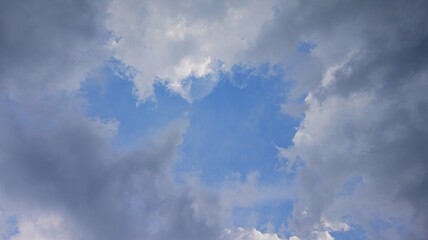 The sky is overcast with black clouds indicating that it will rain, creating a dramatic sky.