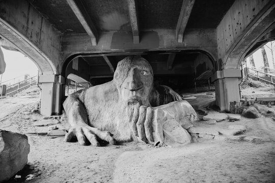 Monochromatic View of the Iconic Fremont Troll Sculpture Under Aurora Bridge in Seattle