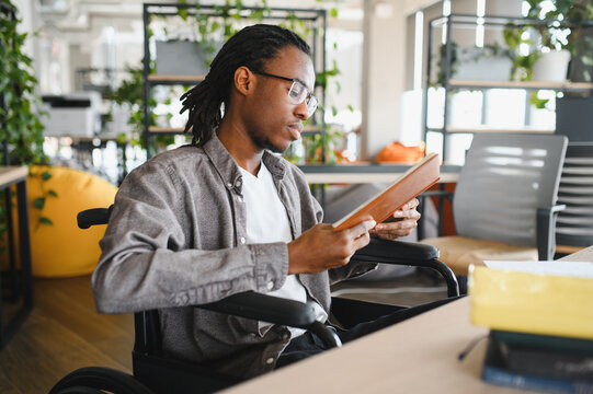 African american student engaged in learning at modern workspace