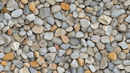 Close-up, varied-sized, grey and tan stones.