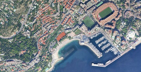 High-Resolution Aerial View of a Mediterranean Coastal City with a Large Marina
