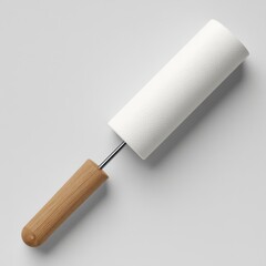 Obraz premium Lint Roller on White Background Close Up Top View Minimalist Style for Cleaning Clothes and Removing Pet Hair