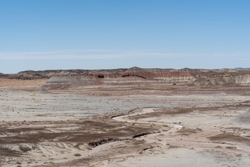 Eroded Desert Landscape at Petrified Forest National Park Under Clear Blue Sky