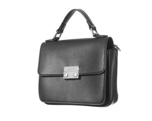 Flying black leather handbag isolated on white background