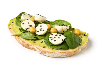 Tasty sandwich with avocado hummus, mozzarella cheese and basil leaves on white background