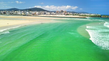 A Stunning Aerial View of the Pristine Beach with its Turquoise Waters and Gorgeous Scenery