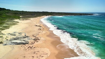 Serene and Tranquil Beach Scene Featuring Azure Waters and Soft Golden Sand Perfect for Relaxation