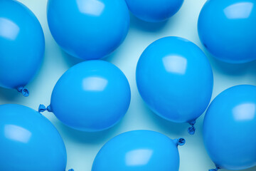 Composition with air balloons on blue background, closeup