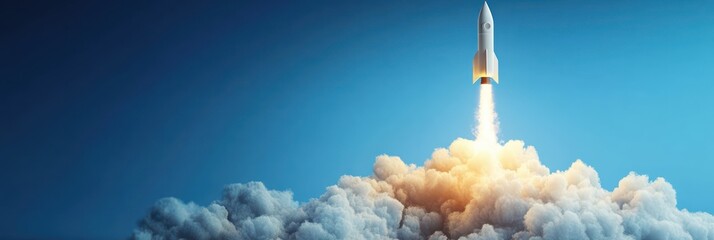 White rocket launching into clear blue sky with bright flames and thick clouds of smoke at liftoff