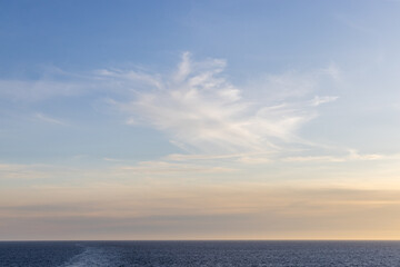 Serene Sunset Over Pacific Ocean With Soft Clouds in BC, Canada