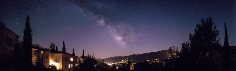 Naklejka premium Night Sky Over Town