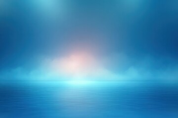 Fototapeta premium Calm and vast ocean under a blue sky with soft light and mist on the horizon creating a peaceful and serene atmosphere
