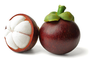 Close-up shot. fresh mangosteen cut in half to reveal white flesh and fresh whole mangosteen. isolated on white background.