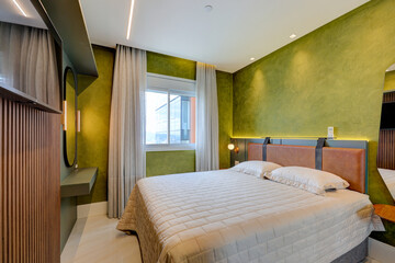 Modern bedroom and bathroom interiors with contemporary design, elegant decor, and natural light in a stylish apartment in Brazil

