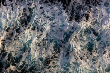 Sea water surface background. Aerial view of vibrant foamy water. Can be used in covers, packaging, posters, textures, brochures, art, and design projects. Classy vector illustration.