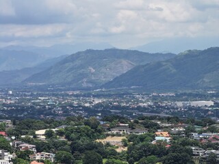 Fototapeta premium Cityscape with Mountain