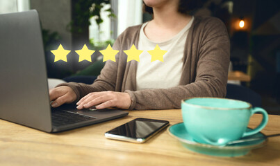 Independent revisor giving five star for satisfaction survey, cafe background, Customer excellent rating concept.