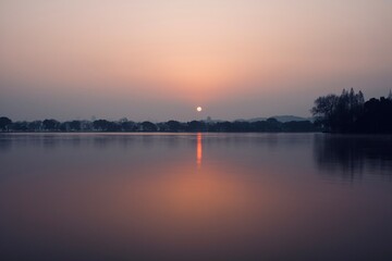 Fototapeta premium sunrise over the lake