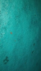 Obraz premium Textured petrol wall, teal shades, mottled effect, rich, interior, contemporary