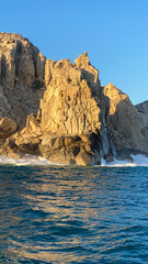 Cabo San Lucas Wave Crashing the Beach and Cliff Rocks from Boat on the Pacific Ocean