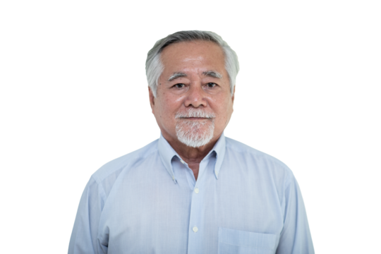 Portrait of senior man in light blue shirt