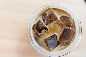 Tasty cold Americano coffee with full of ice cubes, perfect for summer refreshment