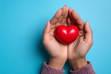 Obraz premium Hands, closeup heart sign, gesture or love symbol on background. Zoom, love and care icon with romance emoji for compassion, kindness and happiness for valentines 