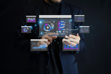 Data analysis concept. Businessman use AI technology for data analysis to uncover market trends and improve competitive advantage in fast-changing industries.