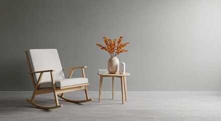 Minimalist interior with rocking chair, side table, and orange blossom in a vase against a gray wall