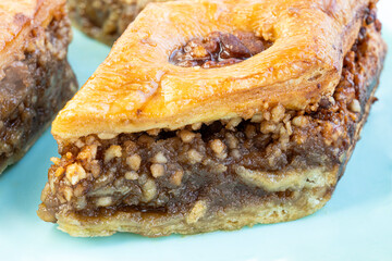 Baklava - traditional middle east sweet desert on blue background.