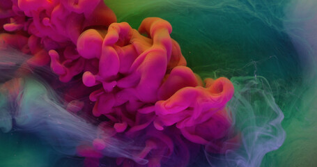 Wave fog. Smoke spray. Bright pink fluid burst in green liquid. Art splash paint on neon color defocused water abstract background.