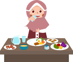 Young girl in hijab at a table filled with food.