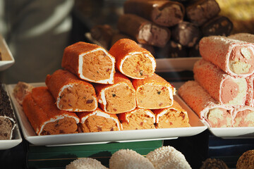 Colorful turkish delight displayed in a bakery window