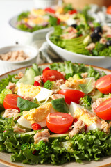 Salad with tuna, close-up, side view.