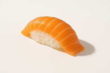 Single piece of fresh salmon nigiri elegantly plated on a clean white background, highlighting its vibrant orange color and delicate rice texture.







