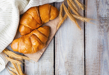 Fresh crispy croissants and a cup of fragrant tea. Breakfast. Morning. customs and culture. Start...