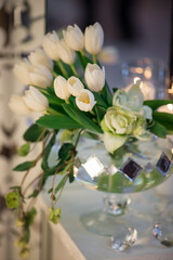 White Tulip Bouquet in Crystal Glass Vase with Candlelight