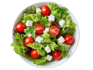 Fresh salad with vibrant red cherry tomatoes, crumbled feta cheese, and a mix of leafy greens served in a white bowl, perfect for a healthy and tasty meal option.
