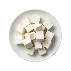 Cubed tofu pieces are neatly arranged on a white plate, creating a visually appealing presentation of this protein-rich and versatile food ingredient.