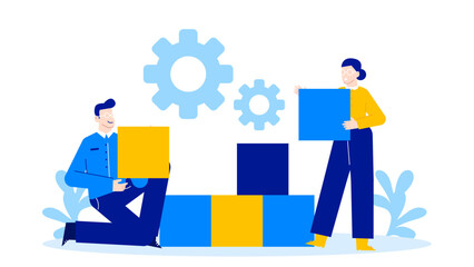 Two people construct a blue and yellow block structure. Suitable for teamwork, construction concepts, education materials, or toy advertisements.