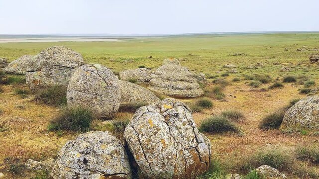 View of the valley of stone balls. Mangystau region.Unique natural places of Kazakhstan. Valley of the Balls. Spherical formations in the Torysh tract were formed about 120-180 million years ago. 4К	