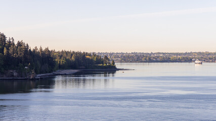 Scenic Coastal View of Stanley Park in Vancouver BC with Calm Waters