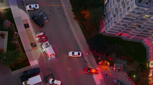 Emergency response and at the scene of an incident in an urban residential area at night. As viewed from a high-rise in distress on September 12, 2016 in Mississauga, Canada.