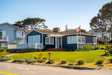 Classic American House with Front Yard and Blue Sky